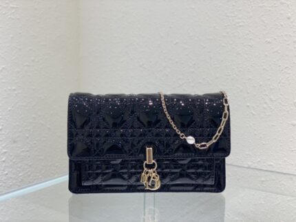 Christian Dior Clutch Bag In Petent Black Leather